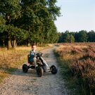 EXIT Foxy skelter met aanhangwagen voor kinderen zwart | vanaf 2 jaar